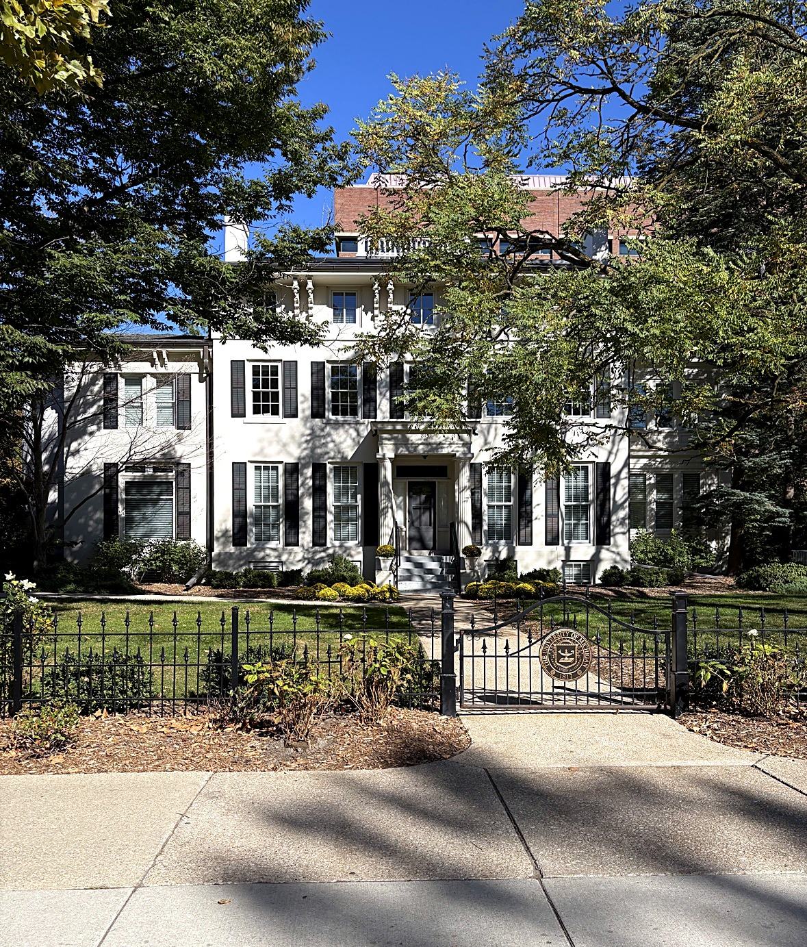 The University of Michigan President's House on South University, behind its iron fence