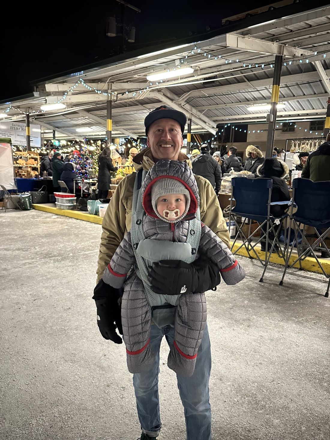 Kristian at a holiday market with his son