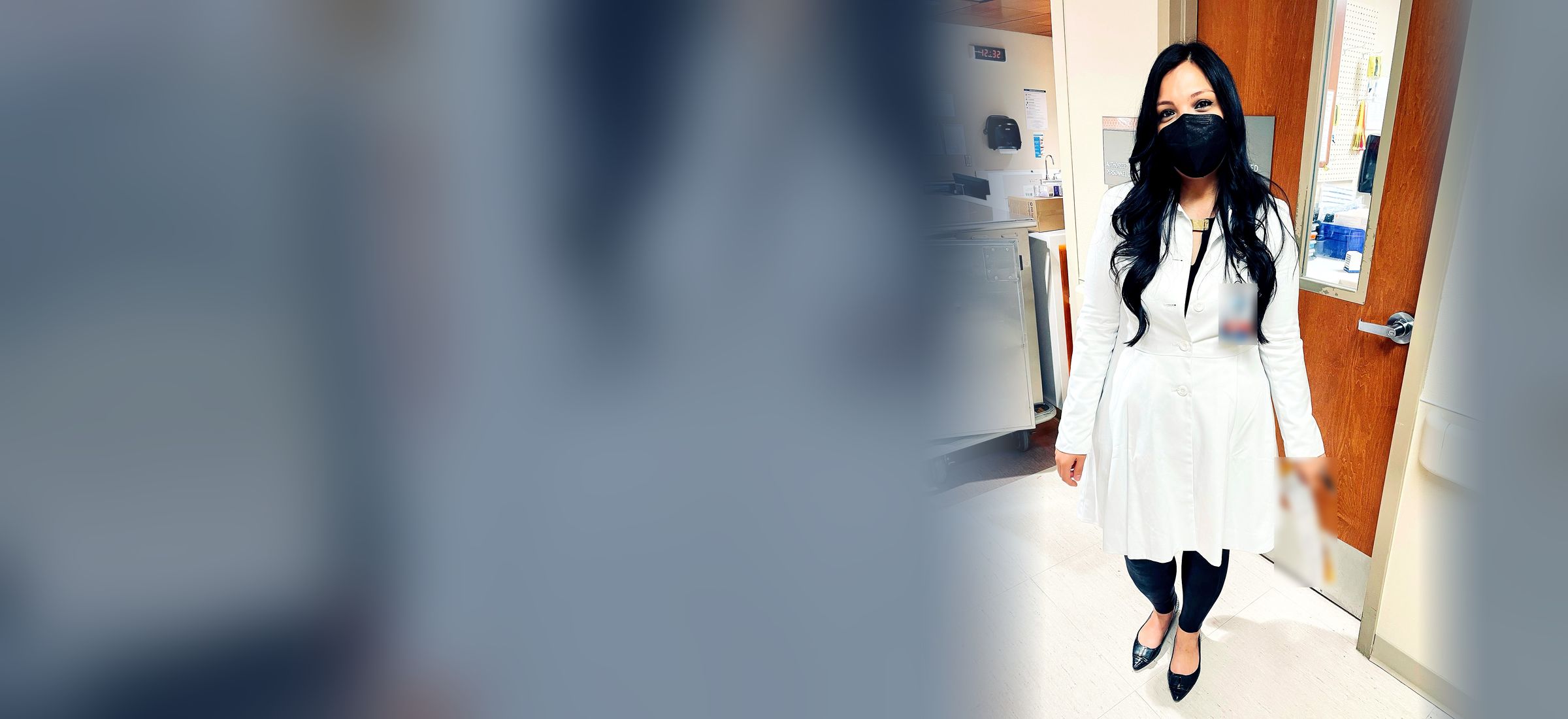 Kristian's wife, Zeinab, a hospitalist, in her white coat at the hospital
