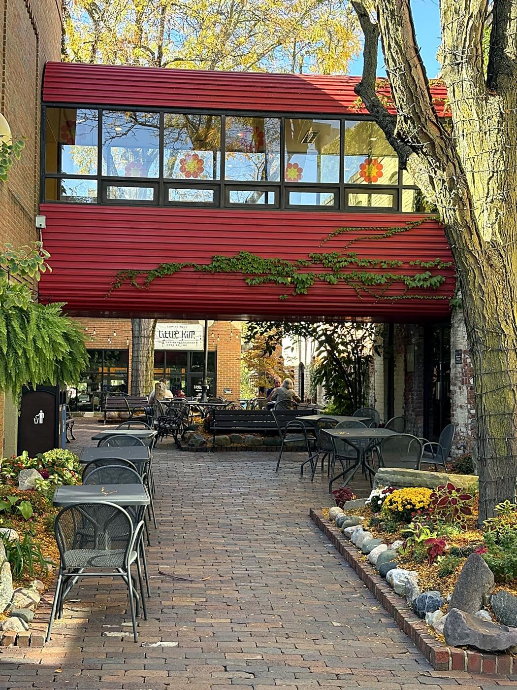 A courtyard under the red bridge in Kerrytown