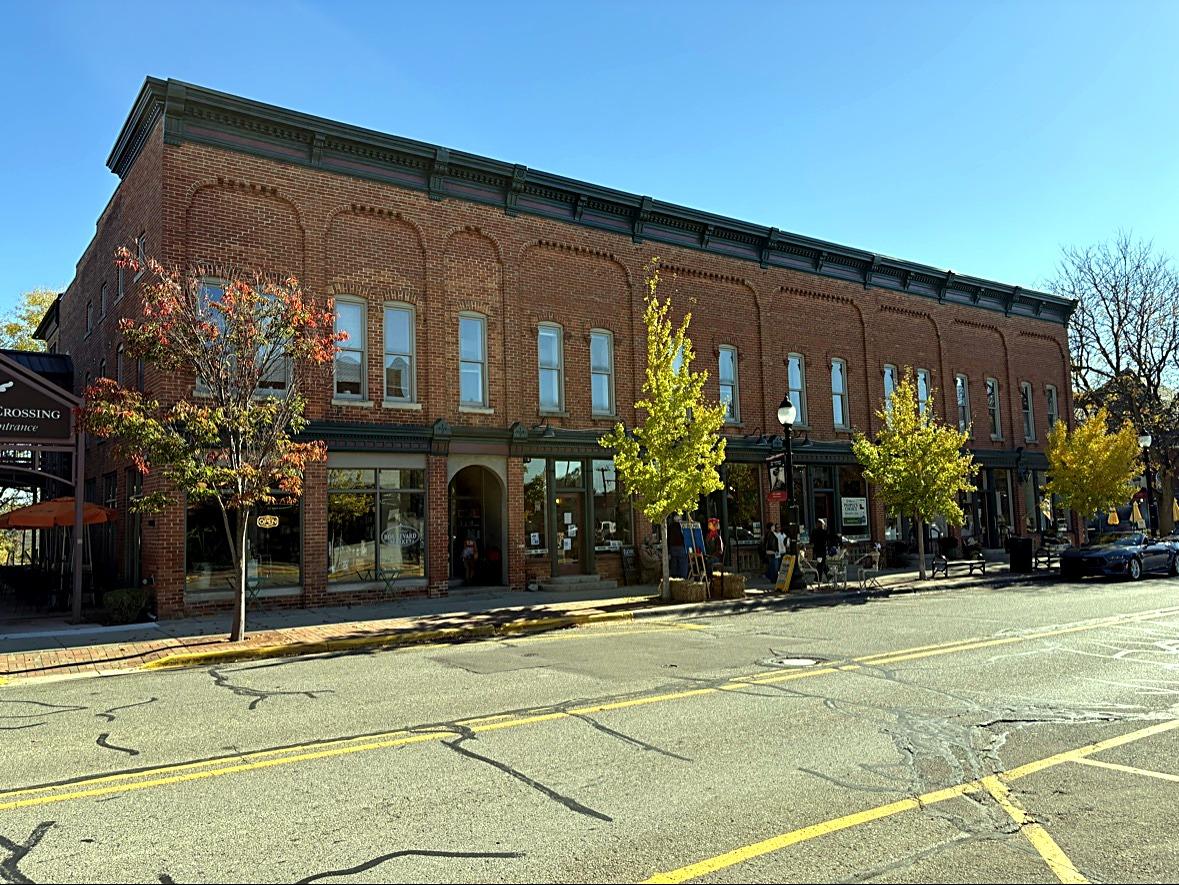 The long brick Murphy’s Crossing block downtown